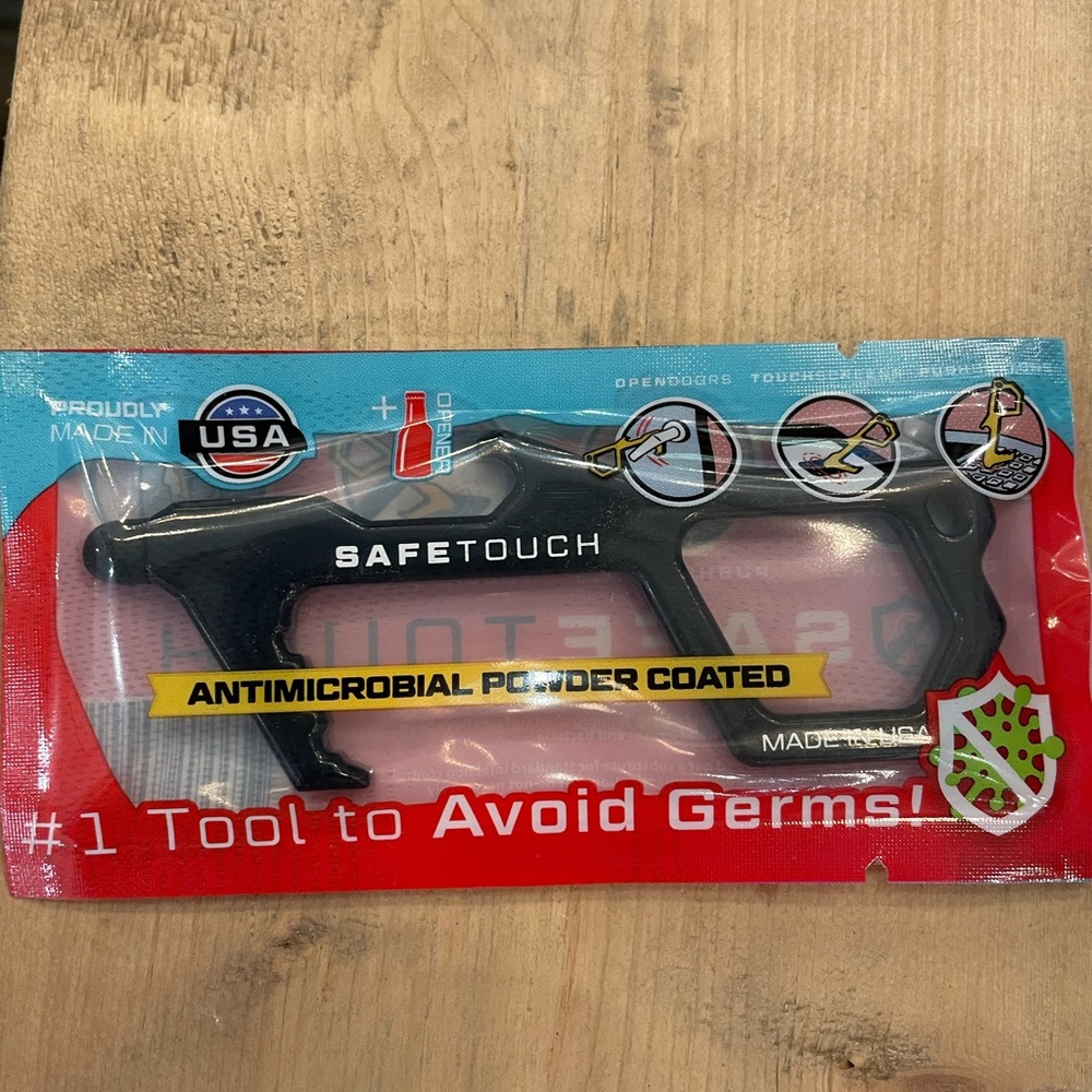 Safe touch key with bottle opener